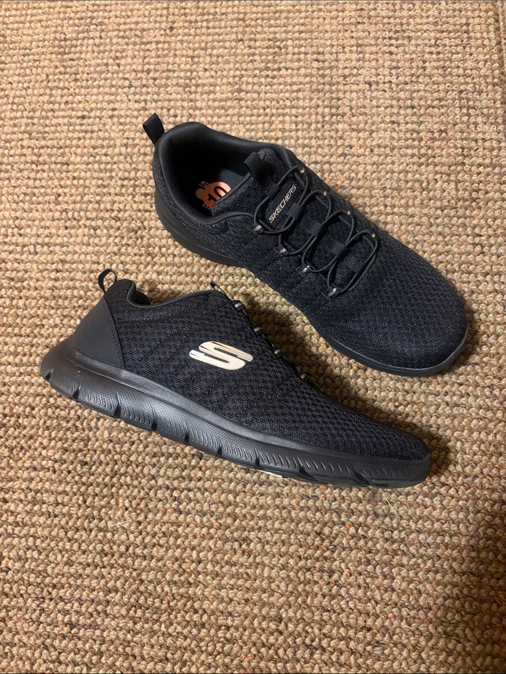 Skechers Men's Black Slip-On Athletic Sneakers with Subtle Logo